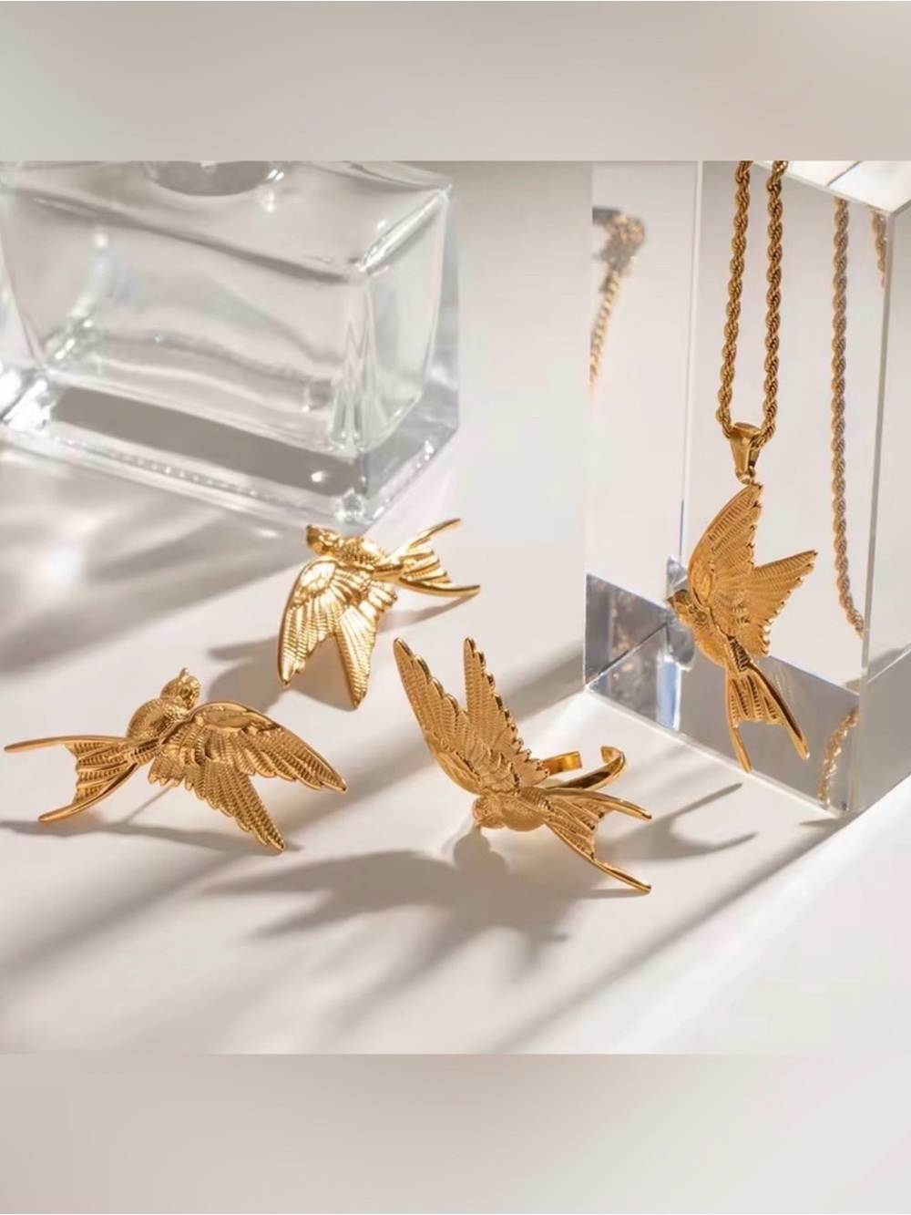 Gold Bird Motif Necklace Earrings and Ring Set
Waterproof Tarnish free - Picture 4 of 7